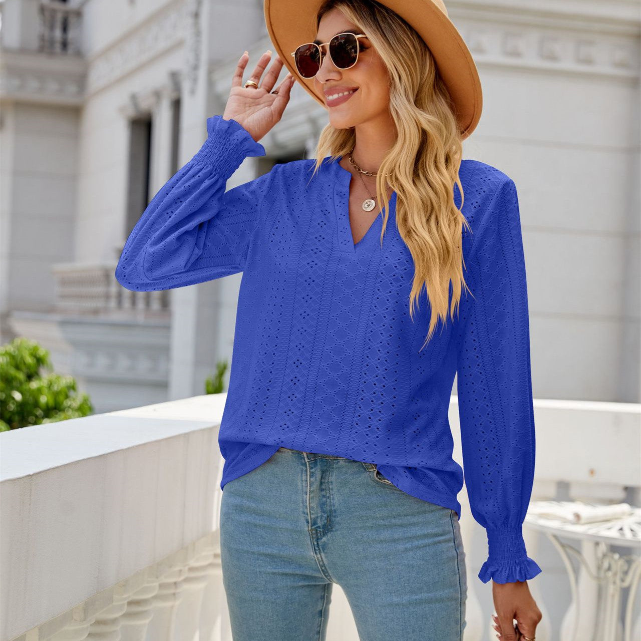 Elevate Your Wardrobe with the Solid Color Hollow-out Pleated Ruffle Sleeve V-neck Loose Long Sleeve Top